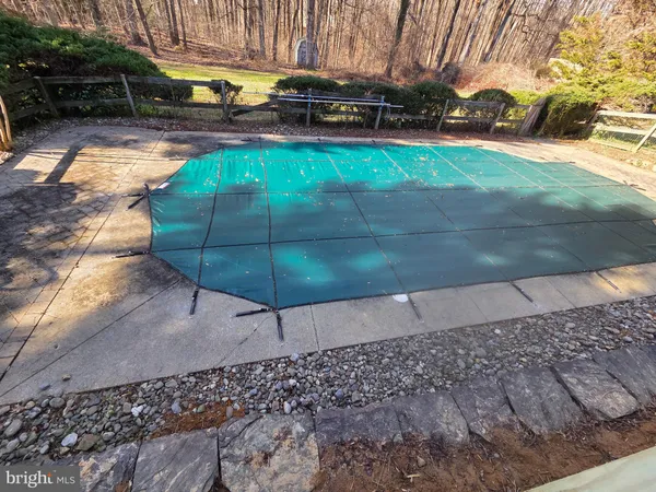 a view of a backyard with a patio