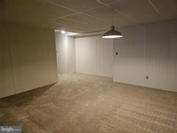a view of a room with an empty space