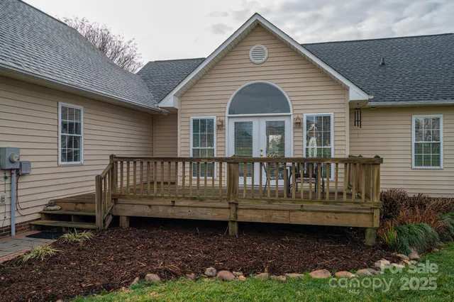 a view of wooden balcony with outdoor space