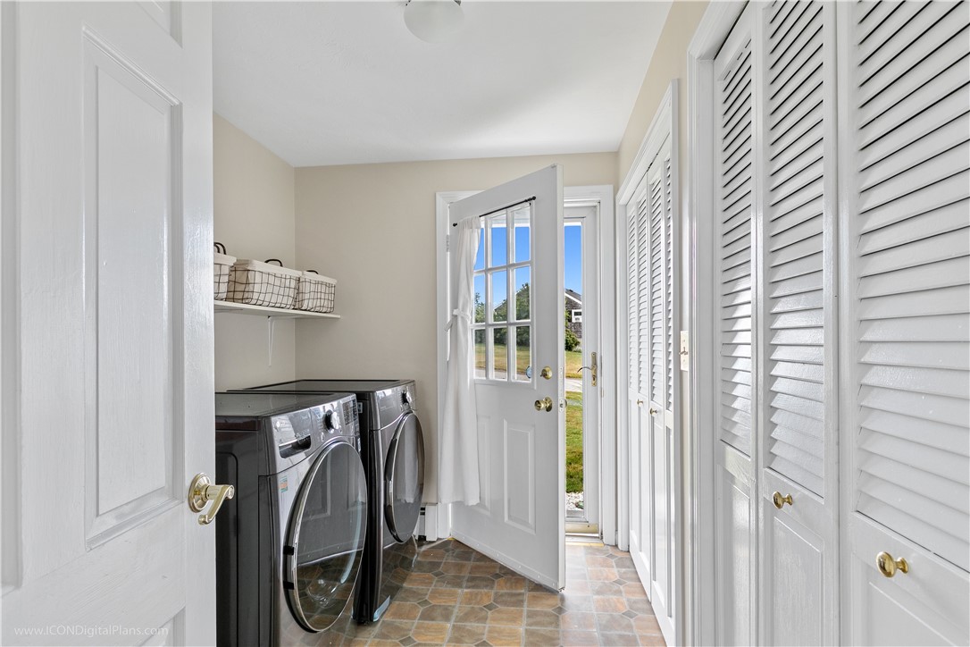 85 Lepes Road Portsmouth, RI 02871 - Photo 23 of 50 Conveniently located on the 1st floor, the laundry mudroom has a lot of space and a wall of storage closets with shelves.