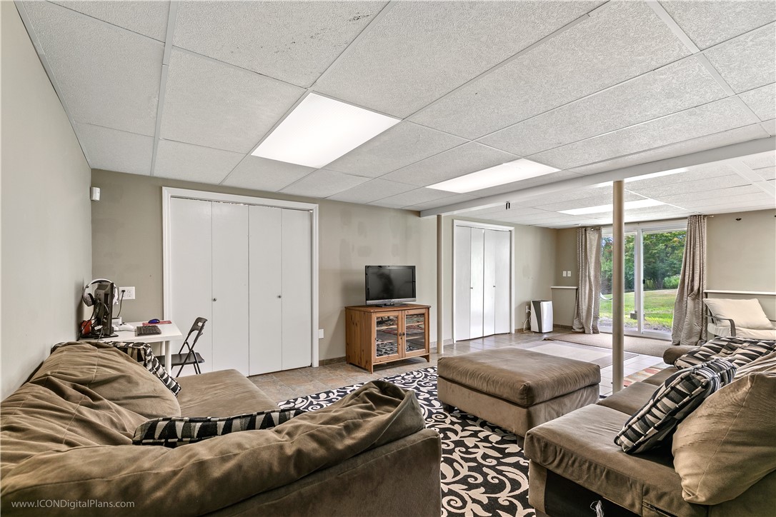 85 Lepes Road Portsmouth, RI 02871 - Photo 41 of 50 Lots of light in this space with the sliders and the full size windows.