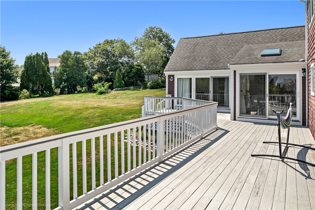 85 Lepes Road Portsmouth, RI 02871 - Photo 43 of 50 Wrap around 500 sq,ft. south facing deck with stairs to the back yard.