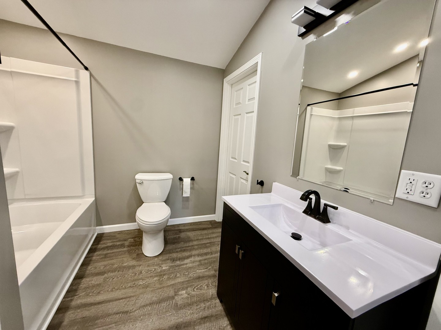 2703 Main Street Peru, IL 61354 - Photo 13 of 23 a bathroom with a sink and a mirror