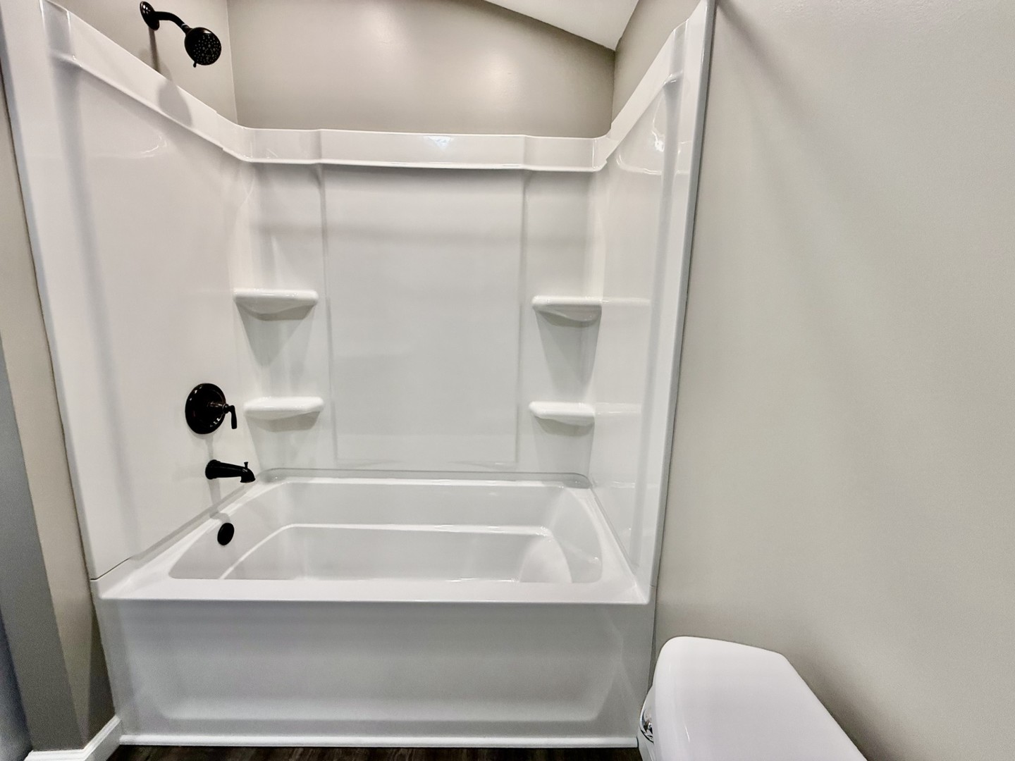 2703 Main Street Peru, IL 61354 - Photo 14 of 23 a bathroom with a bathtub and a toilet