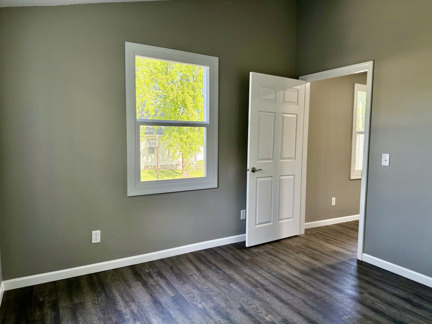 2703 Main Street Peru, IL 61354 - Photo 15 of 23 an empty room with wooden floor and windows
