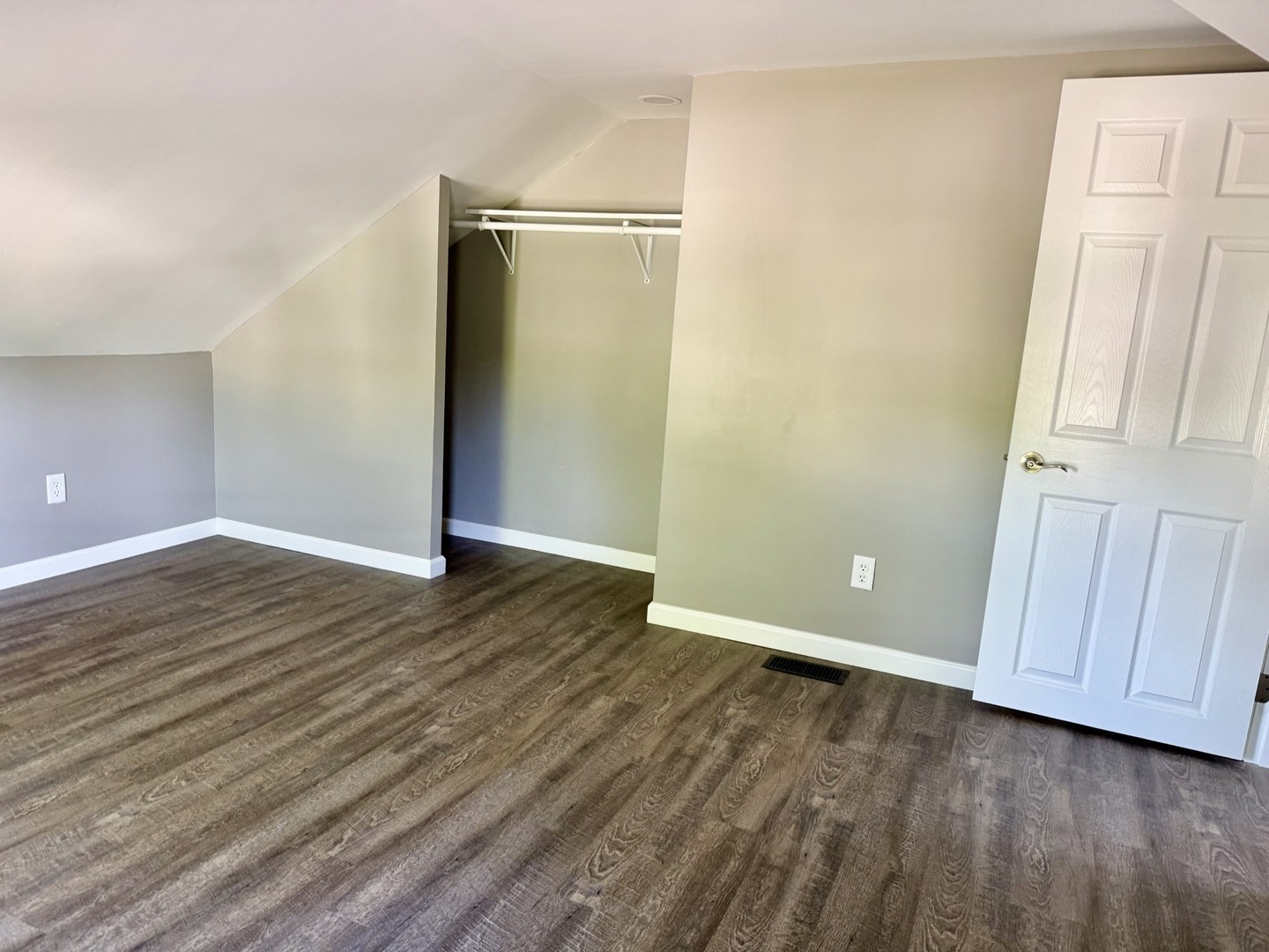 2703 Main Street Peru, IL 61354 - Photo 19 of 23 an empty room with wooden floor and closet