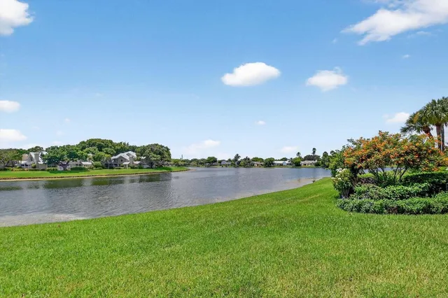 a view of a lake with a city