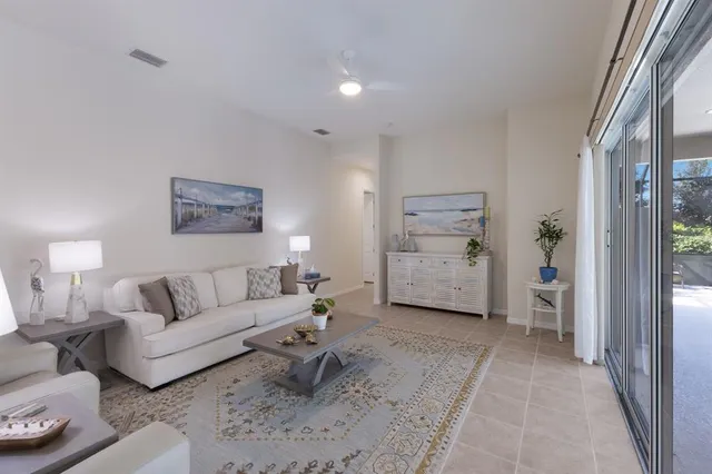 a bath room with a toilet a sink and a bath tub