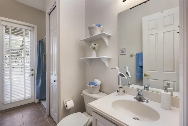 a view of a room with a chandelier and living room