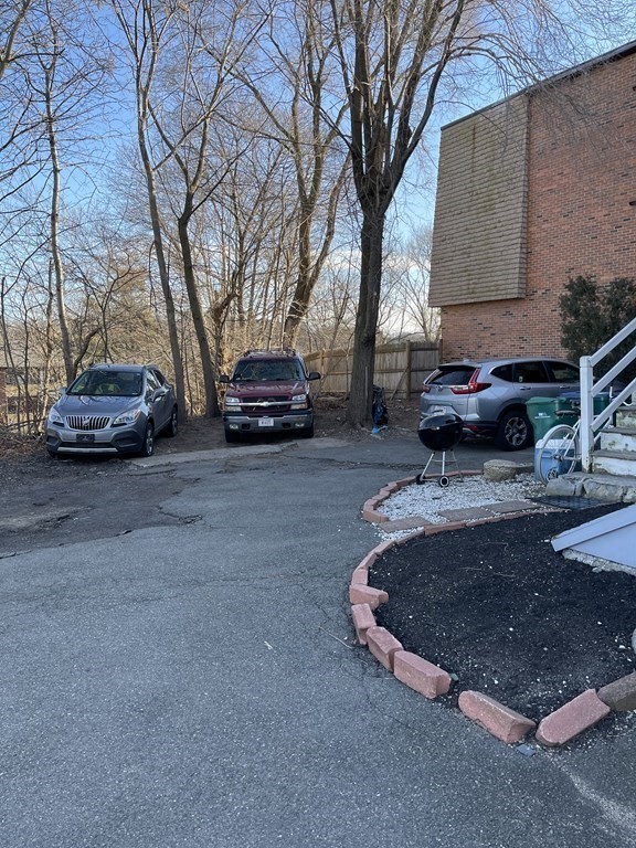 352 Broadway Lynn, MA 01904 - Photo 6 of 6 a view of a house with a cars park