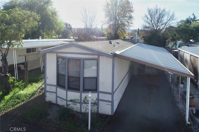 a view of a patio in backyard
