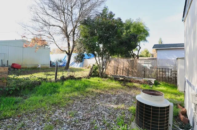 a backyard of a house with lots of green space
