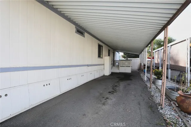 a view of a hallway with stairs