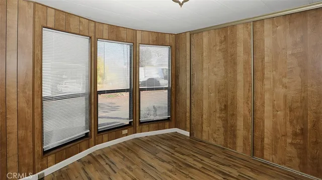 a view of front door with wooden floor