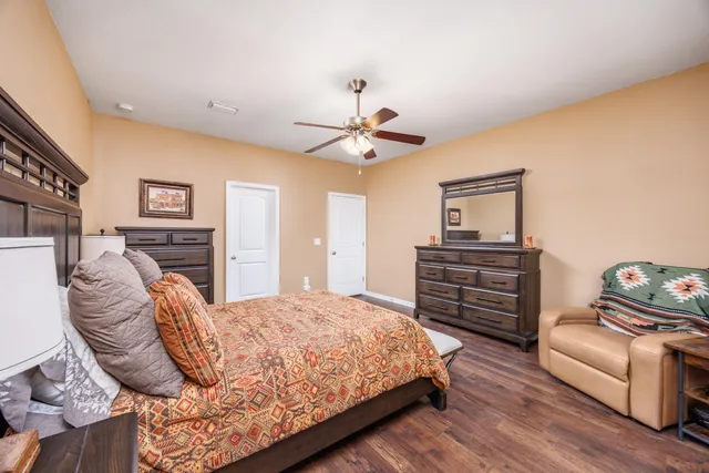 a balcony with outdoor seating and city view