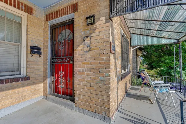 a view of a lake with a house in the background