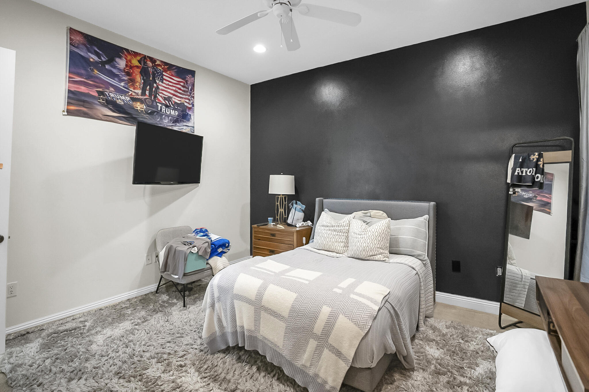 4372 Stonebridge Road Destin, FL 32541 - Photo 34 of 83 a bedroom with a bed and a flat screen tv