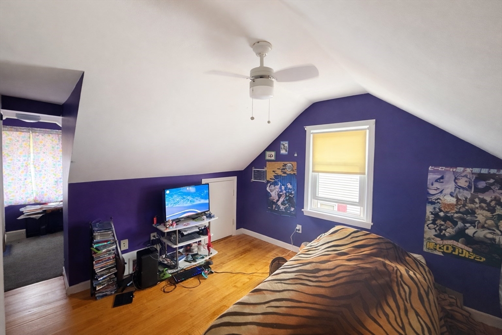 83 Gilman Street Springfield, MA 01118 - Photo 11 of 11 a bedroom with bed and window