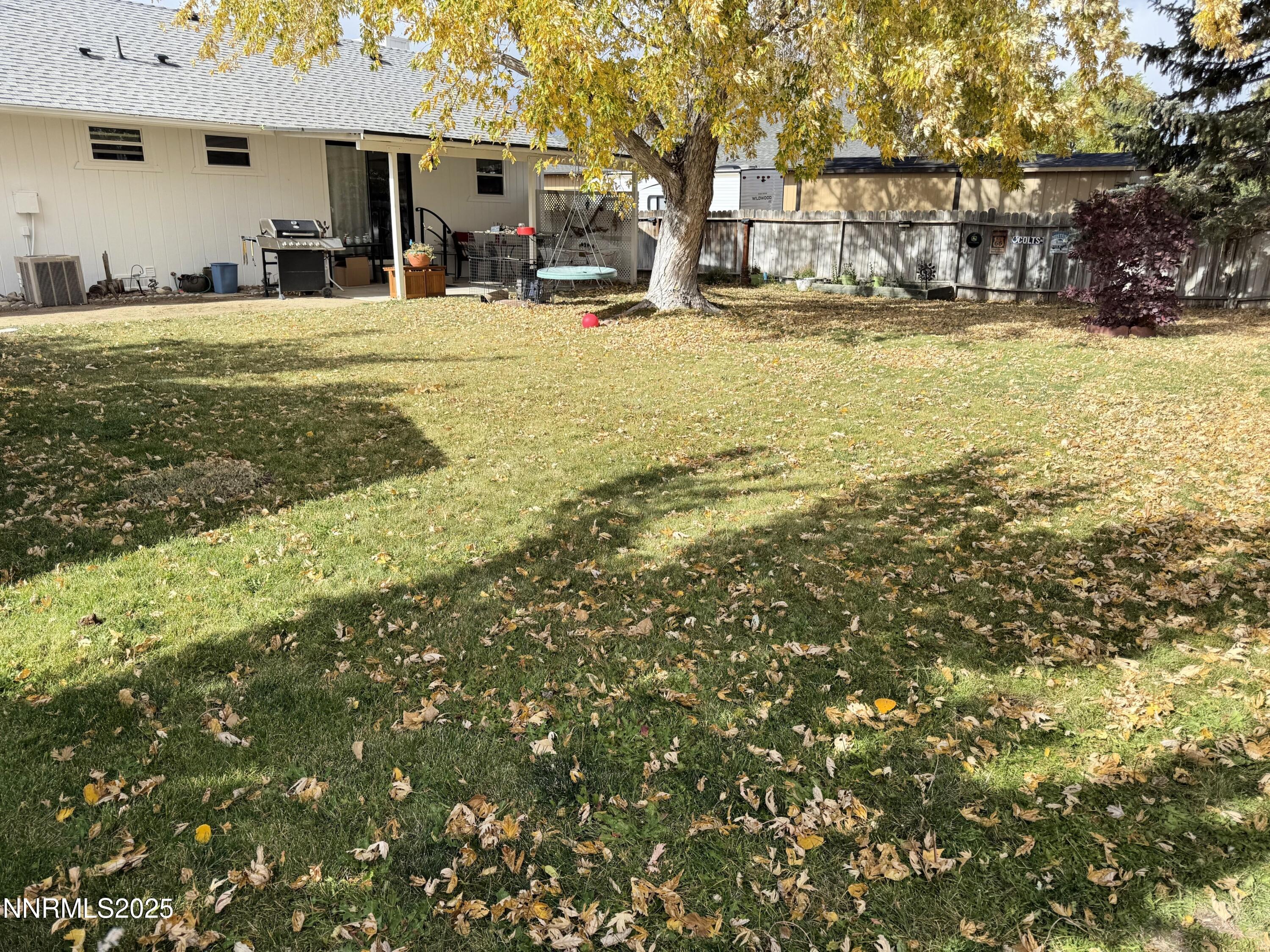 1348 Leonard Road Gardnerville, NV 89460 - Photo 13 of 13 a view of a swimming pool with outdoor seating