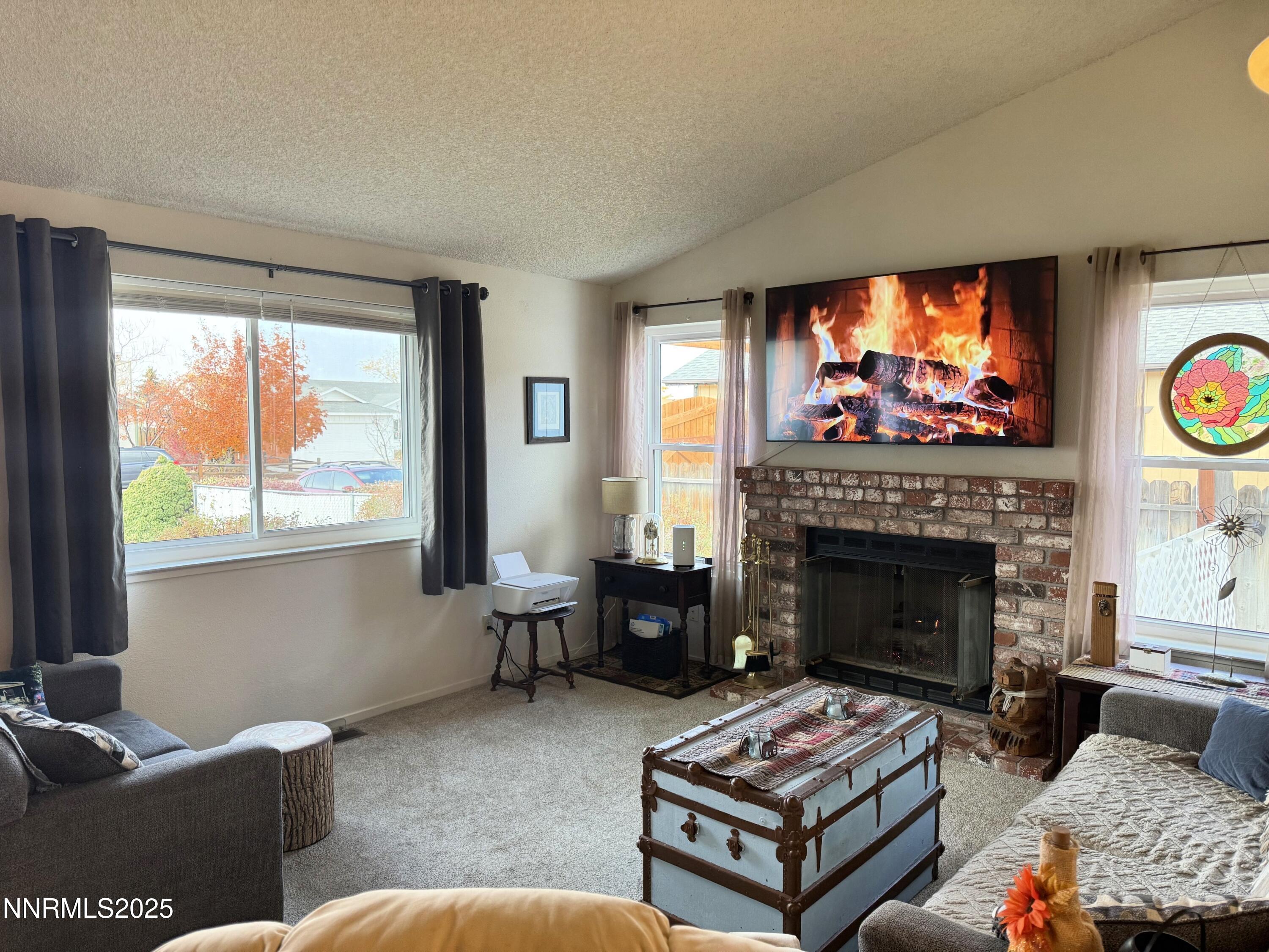 1348 Leonard Road Gardnerville, NV 89460 - Photo 4 of 13 a living room with furniture and a fireplace