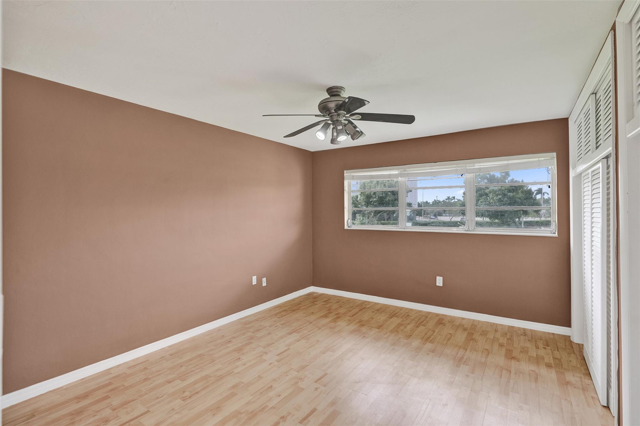7580 Southwest 82nd Street Miami, FL 33143 - Photo 17 of 23 a view of room with window and ceiling fan