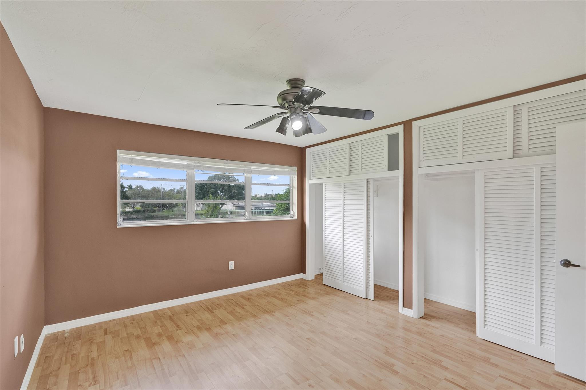 7580 Southwest 82nd Street Miami, FL 33143 - Photo 18 of 23 a view of a room with a ceiling fan and window