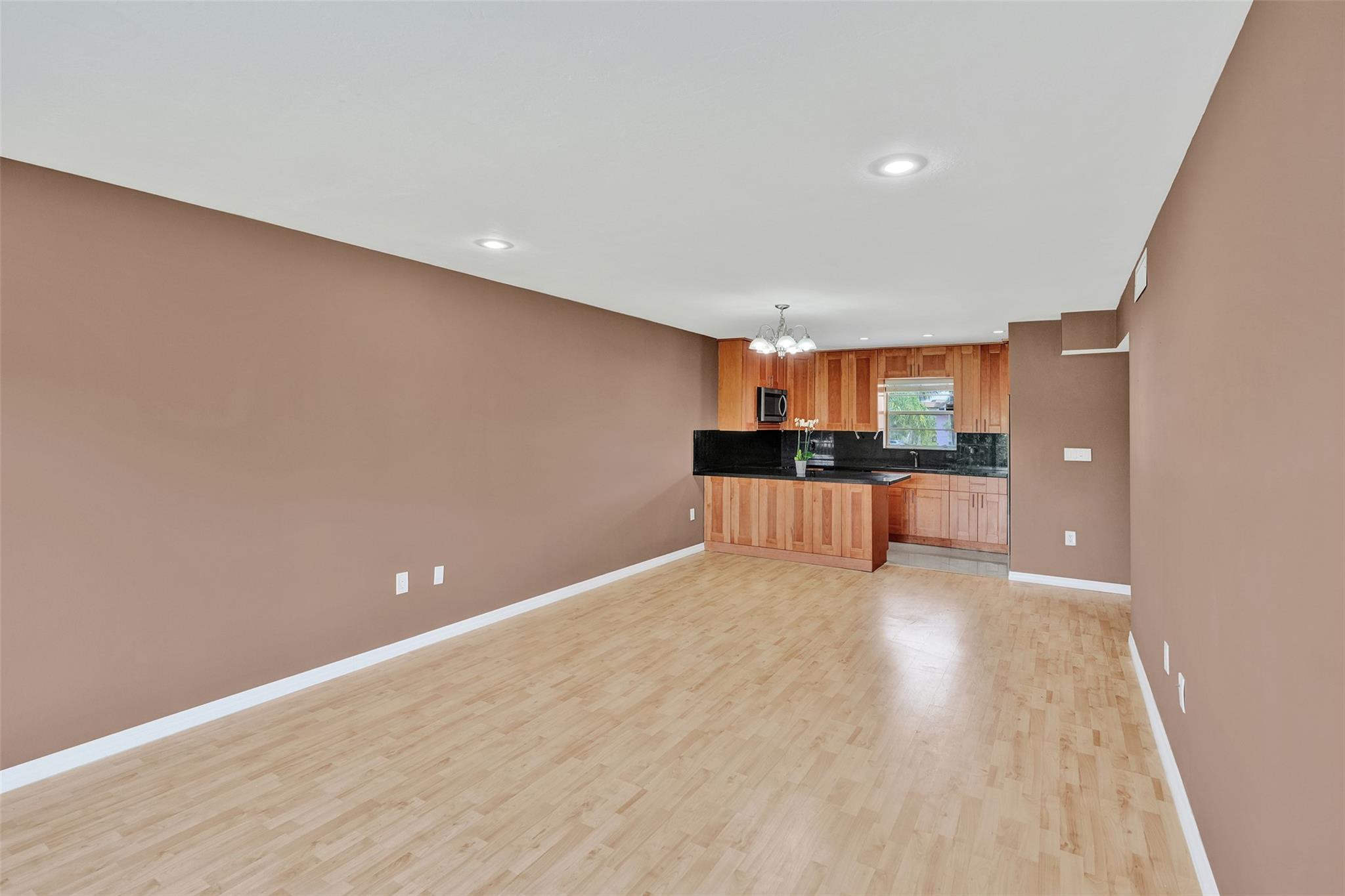 7580 Southwest 82nd Street Miami, FL 33143 - Photo 10 of 23 a view of kitchen and wooden floor