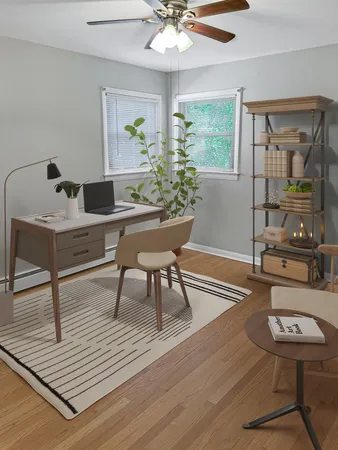 a workspace with furniture and wooden floor