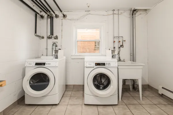 a utility room with dryer and washer