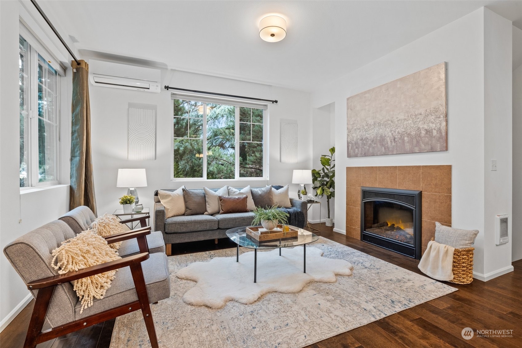10715 Ross Road, Unit B Bothell, WA 98011 - Photo 6 of 21 a living room with furniture and a fireplace
