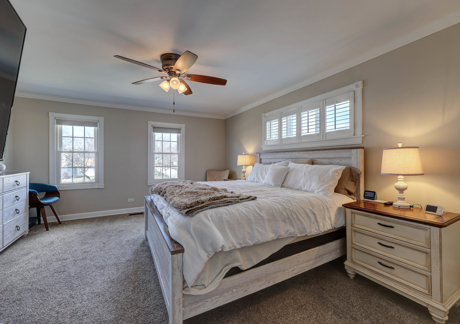 753 Holly Drive Bartlett, IL 60103 - Photo 26 of 43 a bedroom with a bed and a chandelier