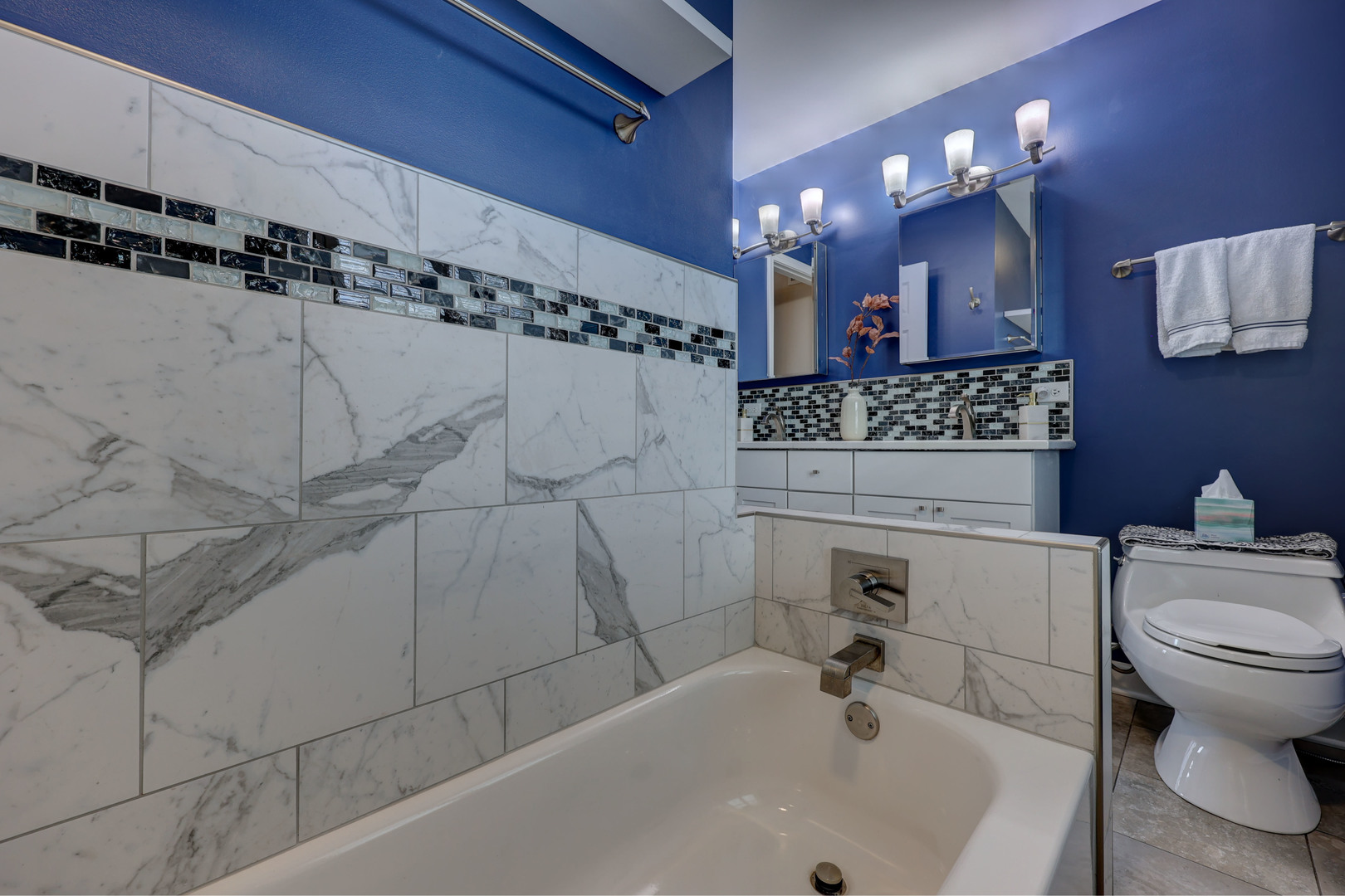 753 Holly Drive Bartlett, IL 60103 - Photo 30 of 43 a bathroom with a sink a toilet and shower