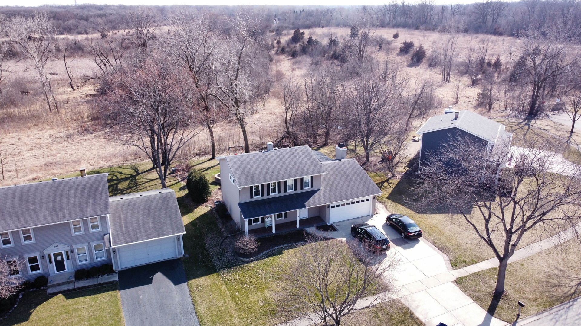 753 Holly Drive Bartlett, IL 60103 - Photo 40 of 43 a view of a house with a yard and sitting area