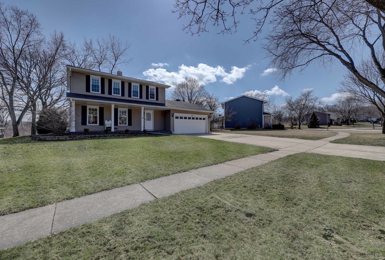 753 Holly Drive Bartlett, IL 60103 - Photo 4 of 43 a view of a house with a yard and large trees