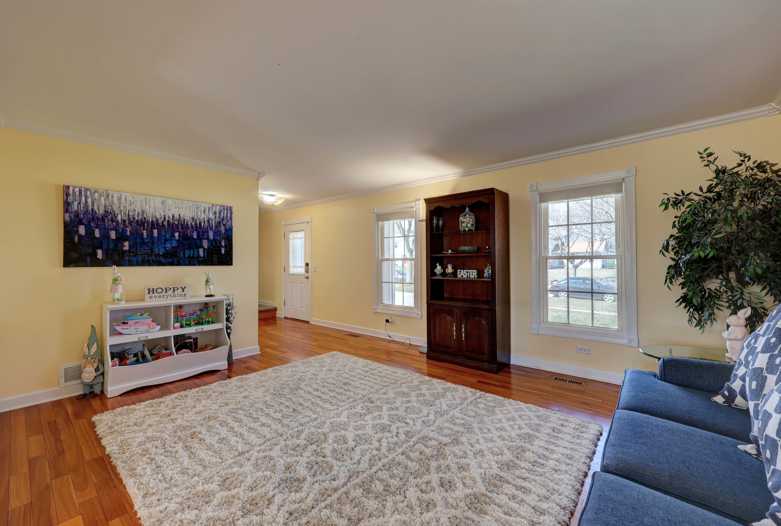 753 Holly Drive Bartlett, IL 60103 - Photo 6 of 43 a living room with furniture and a flat screen tv