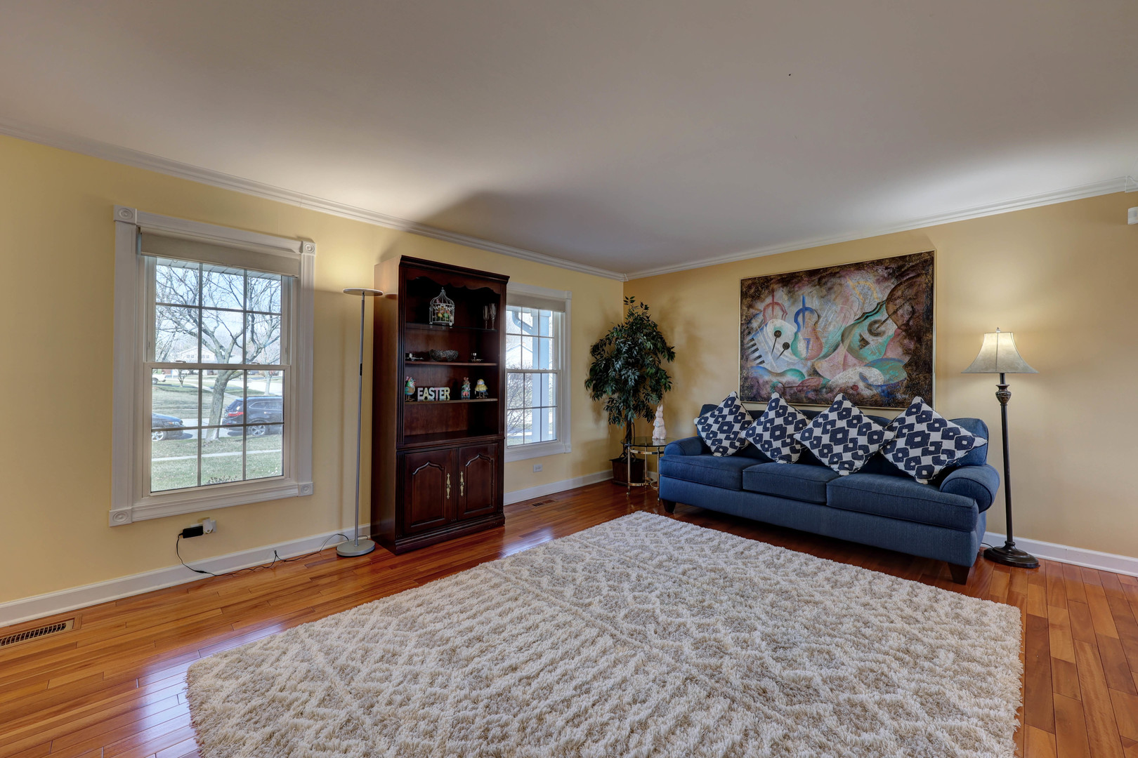 753 Holly Drive Bartlett, IL 60103 - Photo 7 of 43 a bedroom with a bed and a dresser in it