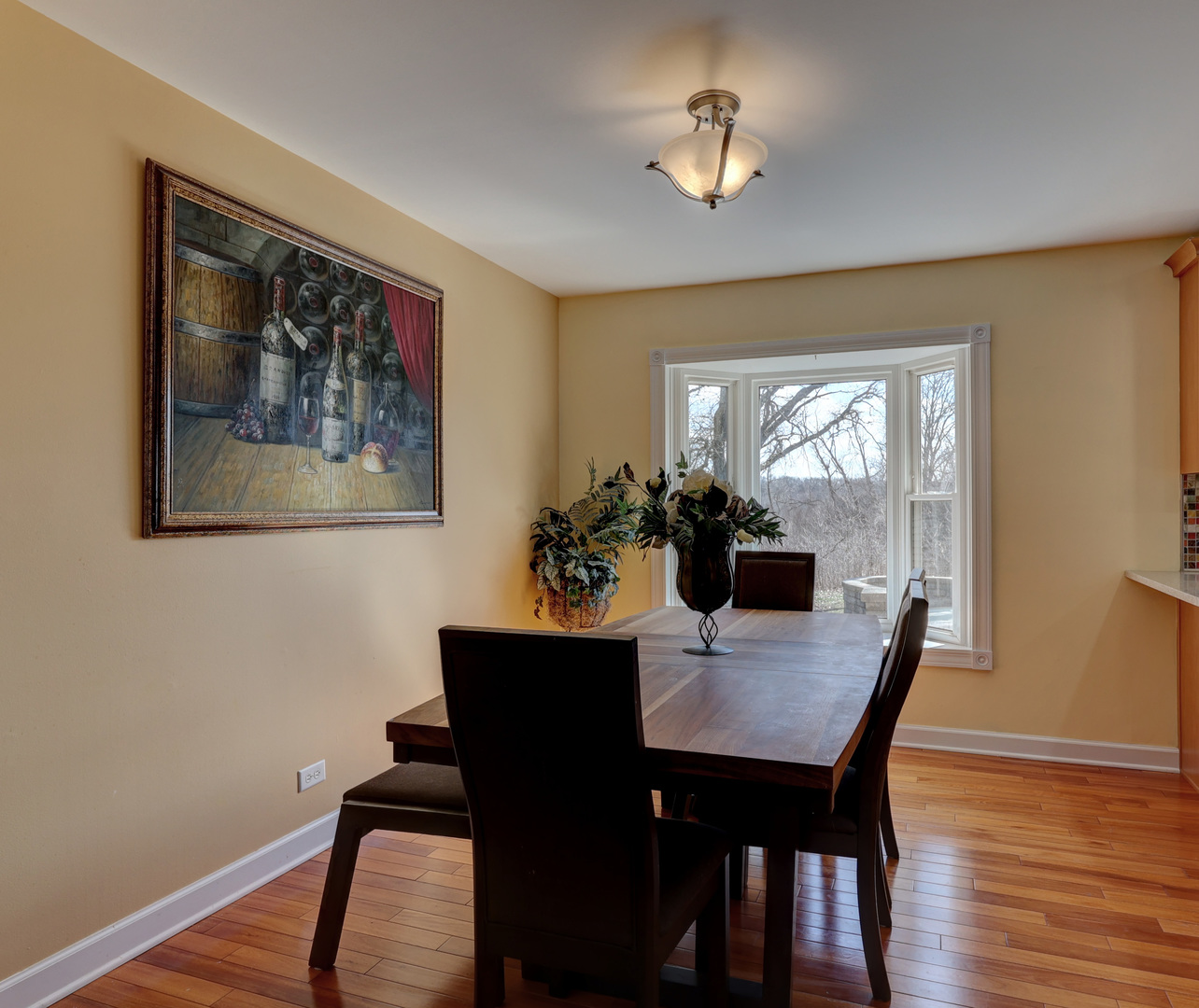 753 Holly Drive Bartlett, IL 60103 - Photo 8 of 43 a view of a dining room with furniture window and wooden floor