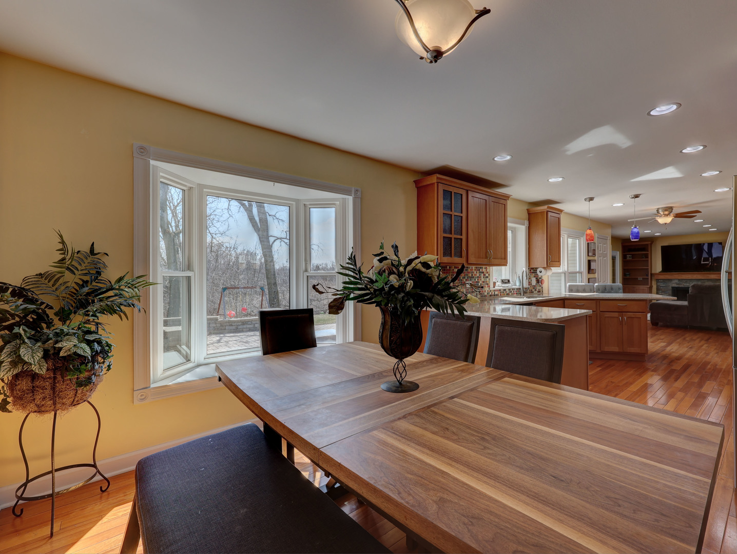 753 Holly Drive Bartlett, IL 60103 - Photo 9 of 43 a kitchen with a table and chairs