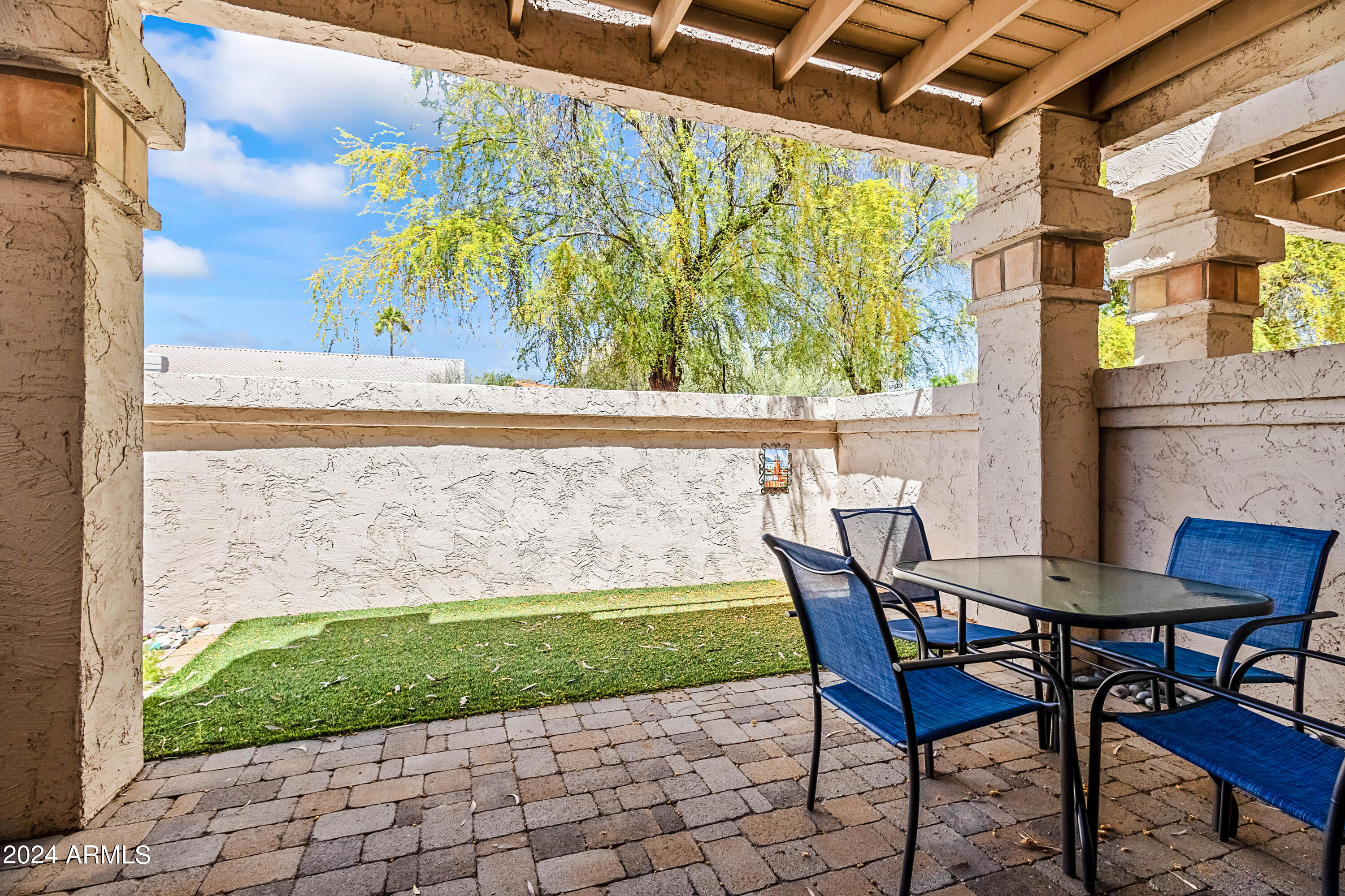 9705 East Mountain View Road, Unit 1038 Scottsdale, AZ 85258 - Photo 17 of 31 BACKYARD + PATIO VIEW