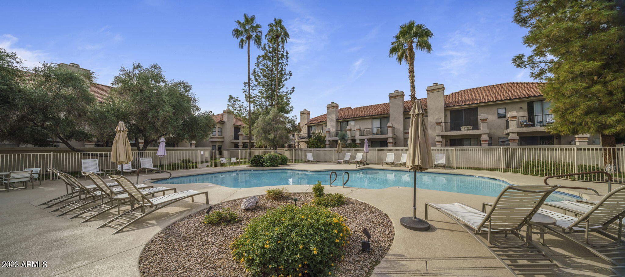 9705 East Mountain View Road, Unit 1038 Scottsdale, AZ 85258 - Photo 29 of 31 POOL 1- CLOSEST TO TOWNHOME