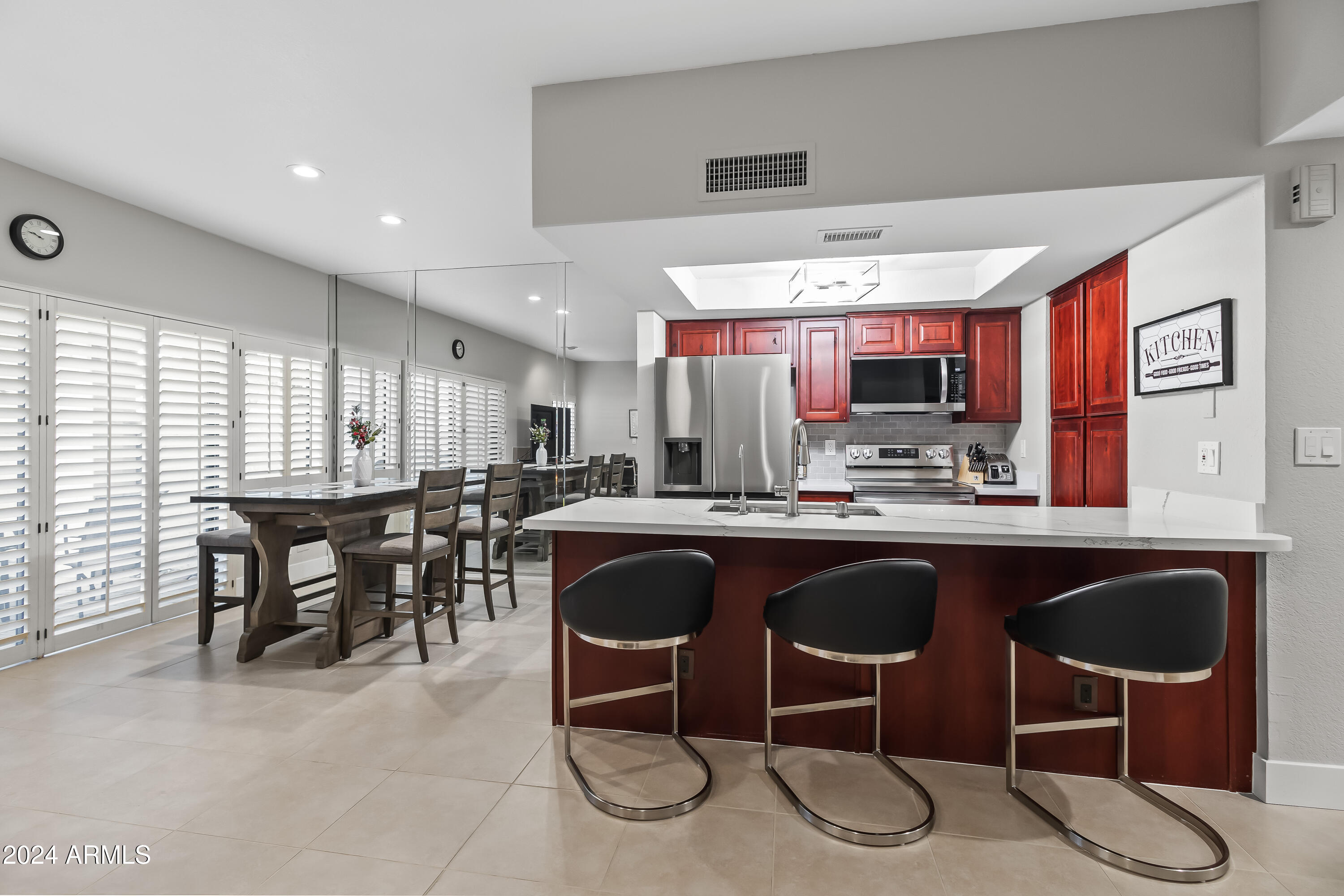 9705 East Mountain View Road, Unit 1038 Scottsdale, AZ 85258 - Photo 5 of 31 KITCHEN- DINING VIEW