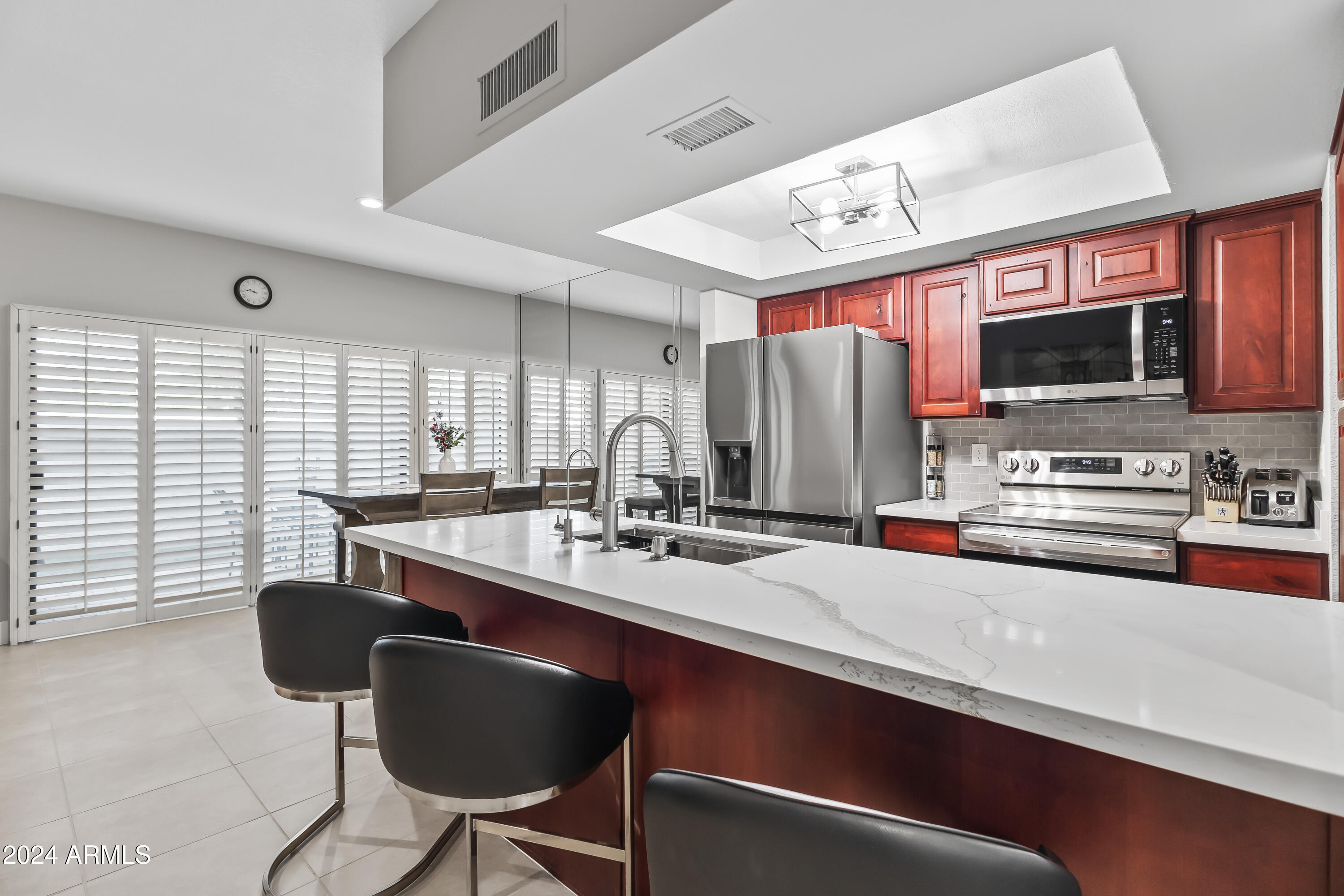 9705 East Mountain View Road, Unit 1038 Scottsdale, AZ 85258 - Photo 7 of 31 KITCHEN OPENS TO MAIN LIVING - IDEAL FOR