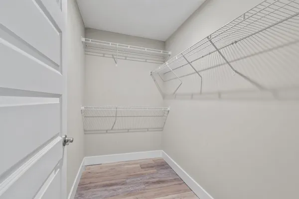 a view of an empty walk in closet
