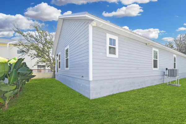 a view of a backyard with a garden