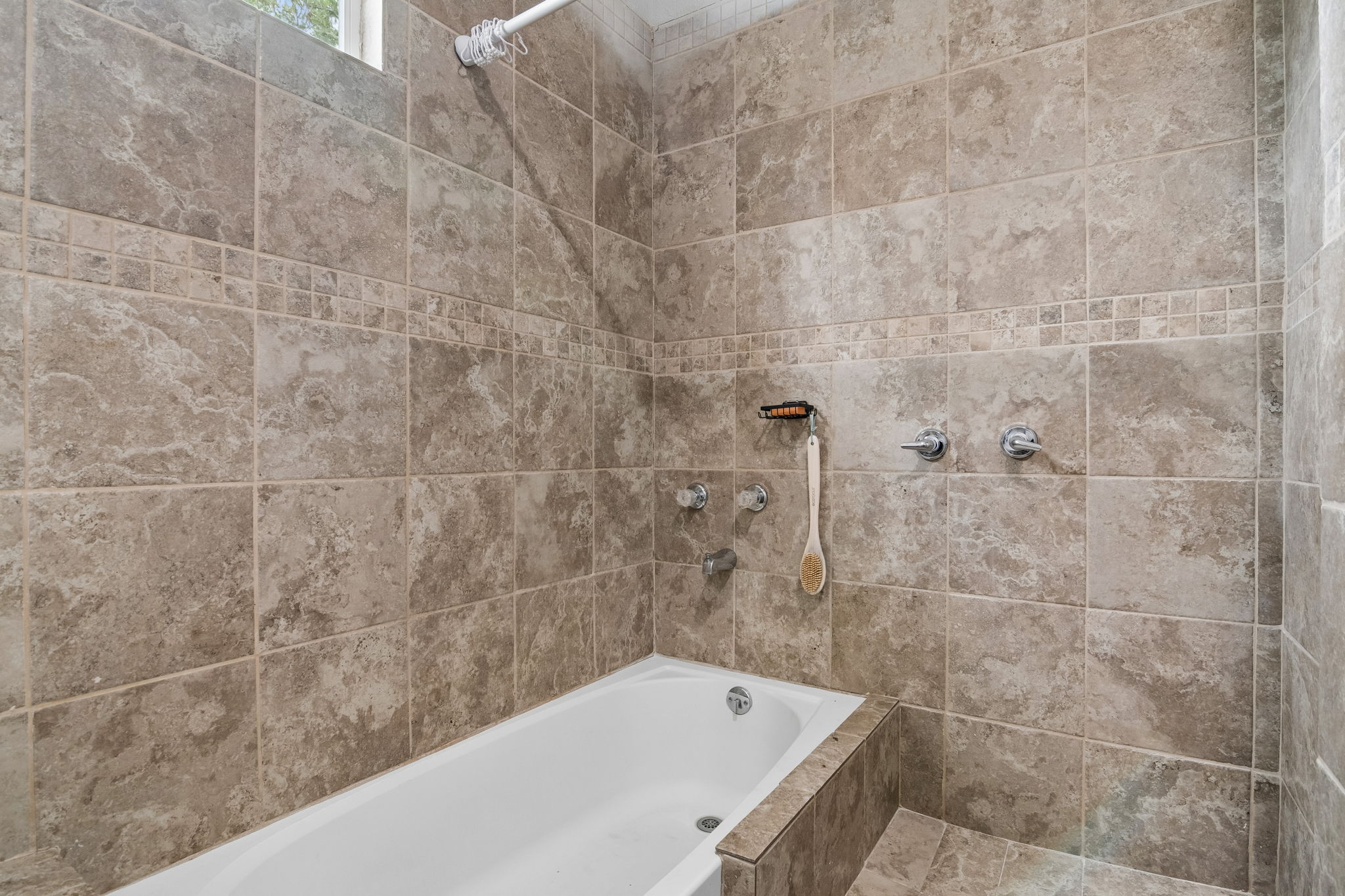 810 Lamar Street Luling, TX 78648 - Photo 12 of 21 a bathroom with a bathtub and shower