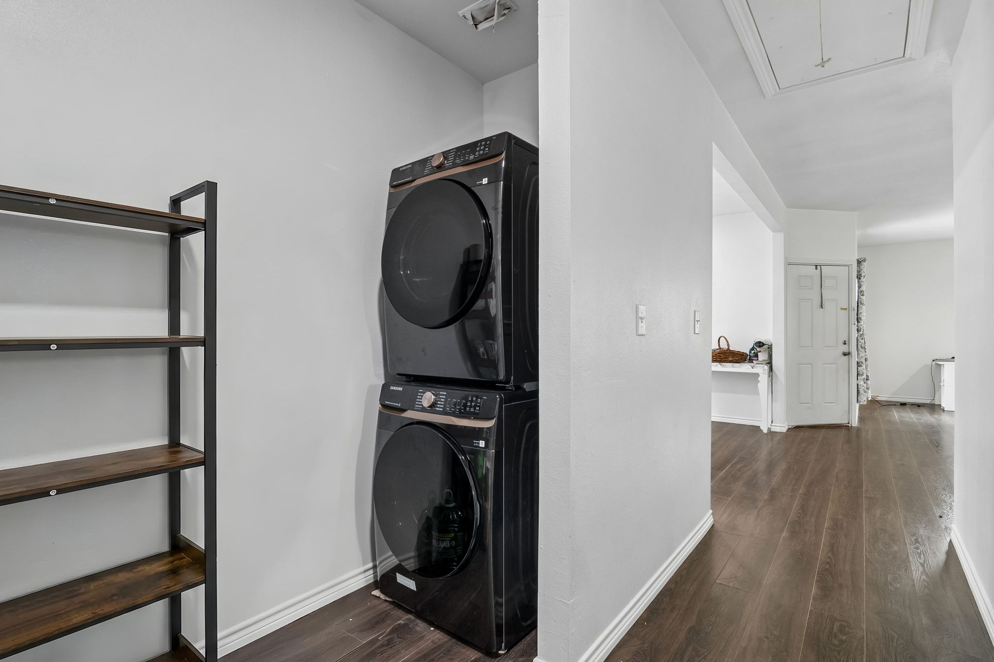 810 Lamar Street Luling, TX 78648 - Photo 8 of 21 a view of a hallway with washer and dryer