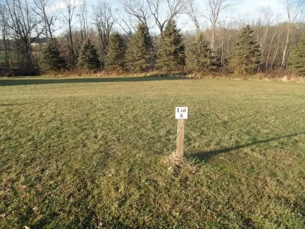 a view of a lake with mountain in the background