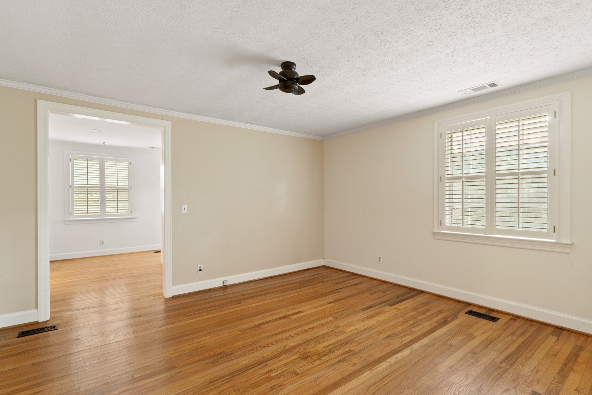 6325 Robin Hill Road Nashville, TN 37205 - Photo 28 of 47 primary suite. Unique setup - 2 full bathrooms are accessed through this bedroom. One full bath is on the right. The other is through the entrance in the photo, along with a large walk in closet area.