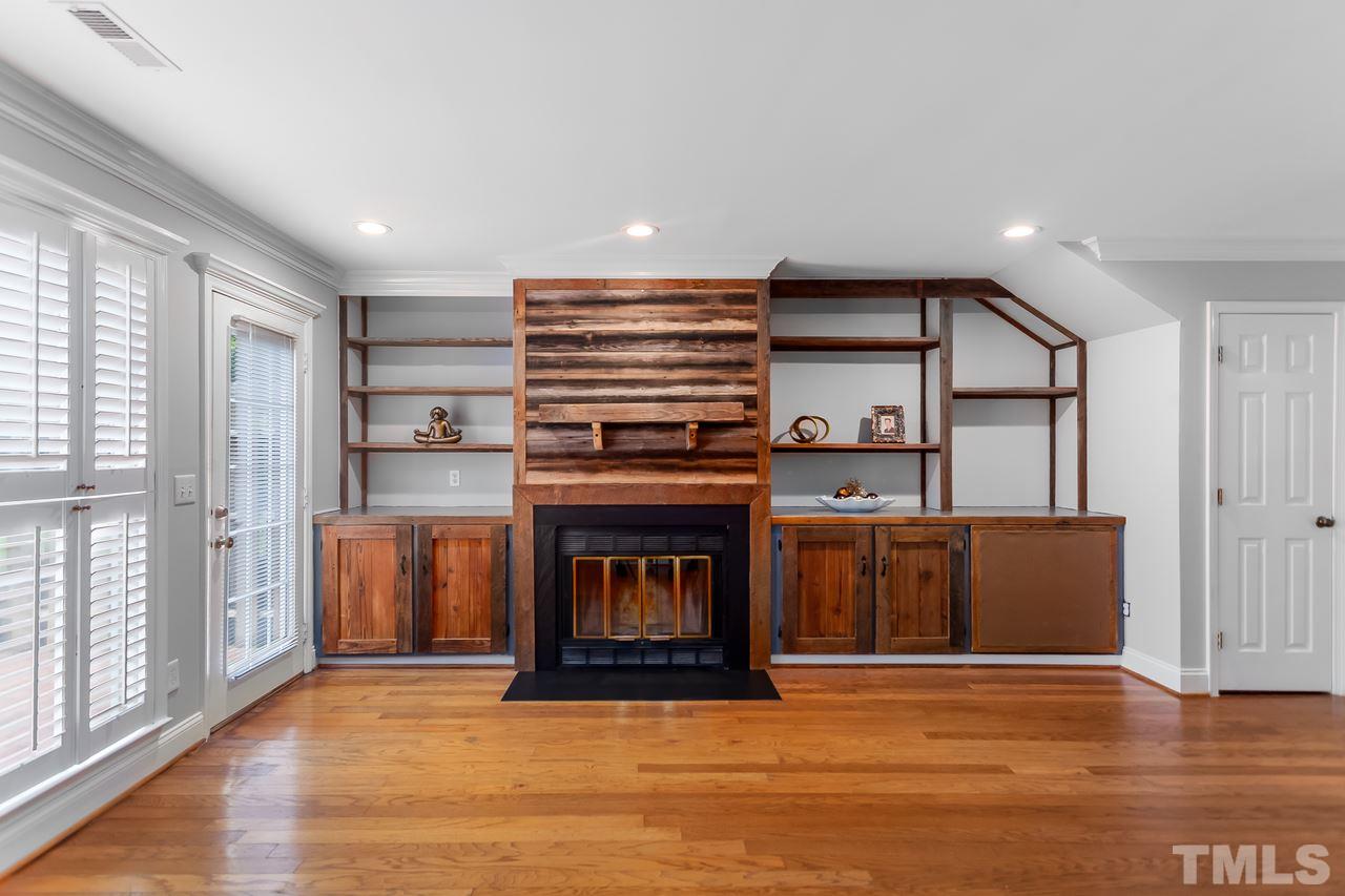 6903 Saxby Court Raleigh, NC 27613 - Photo 5 of 11 Looking for character?? The custom built-ins are made with reclaimed tobacco farm wood!
