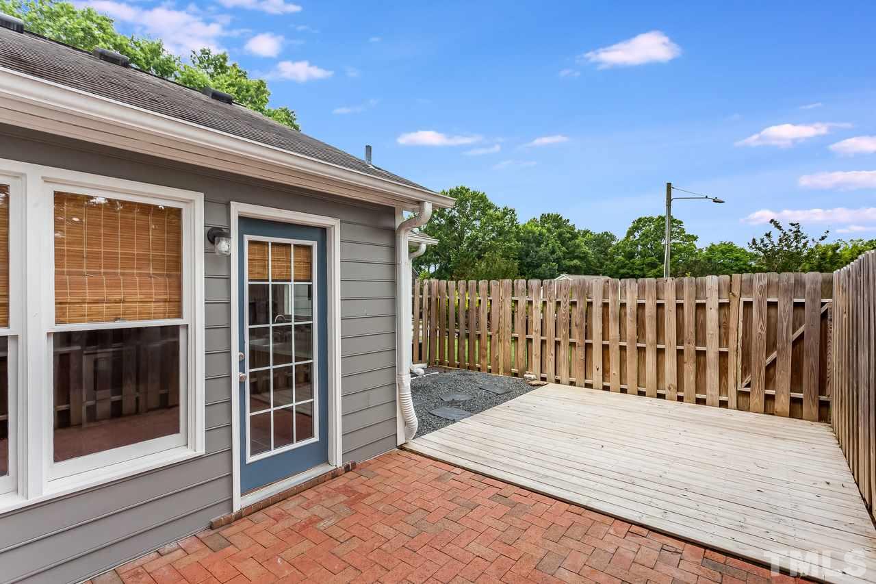 6903 Saxby Court Raleigh, NC 27613 - Photo 10 of 11 And the creme de la creme is this amazing outdoor space! You'll enjoy many days and nights entertaining and relaxing outside on the large, private patio and deck!